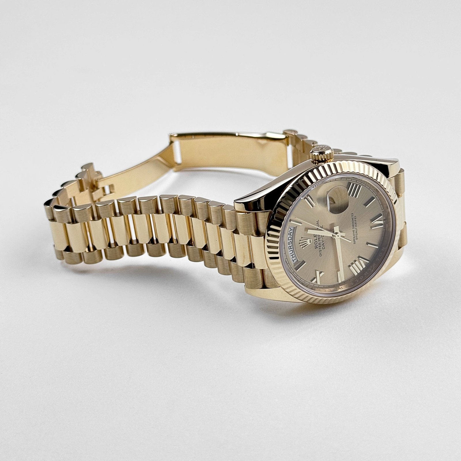 R01ex Day-Date 40 228238 Yellow Gold Champagne Roman Dial